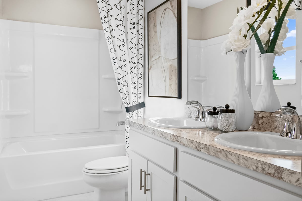 Dual-sink vanity at primary bath