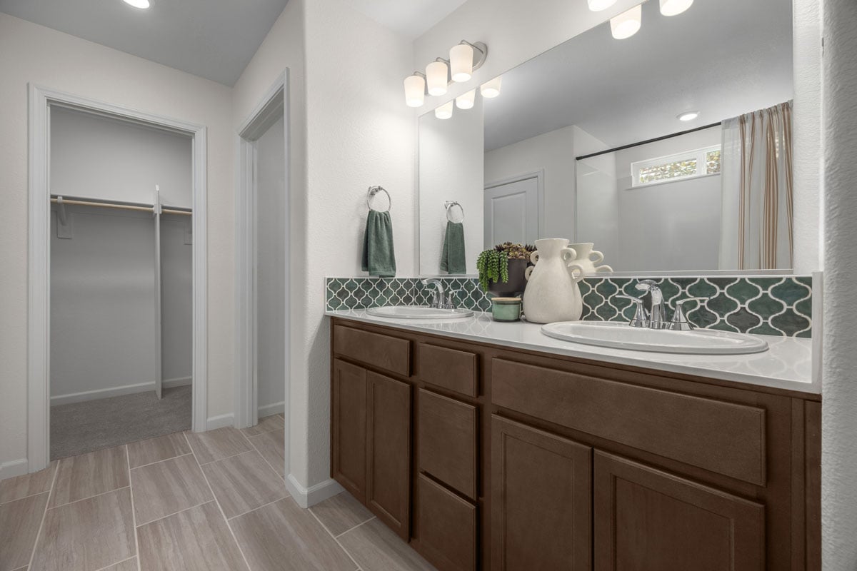 Dual-sink vanity at primary bath
