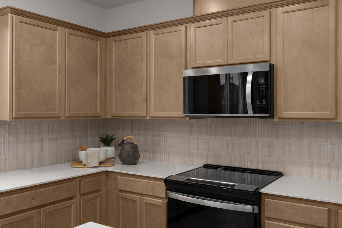 Recessed-panel stained birch cabinetry