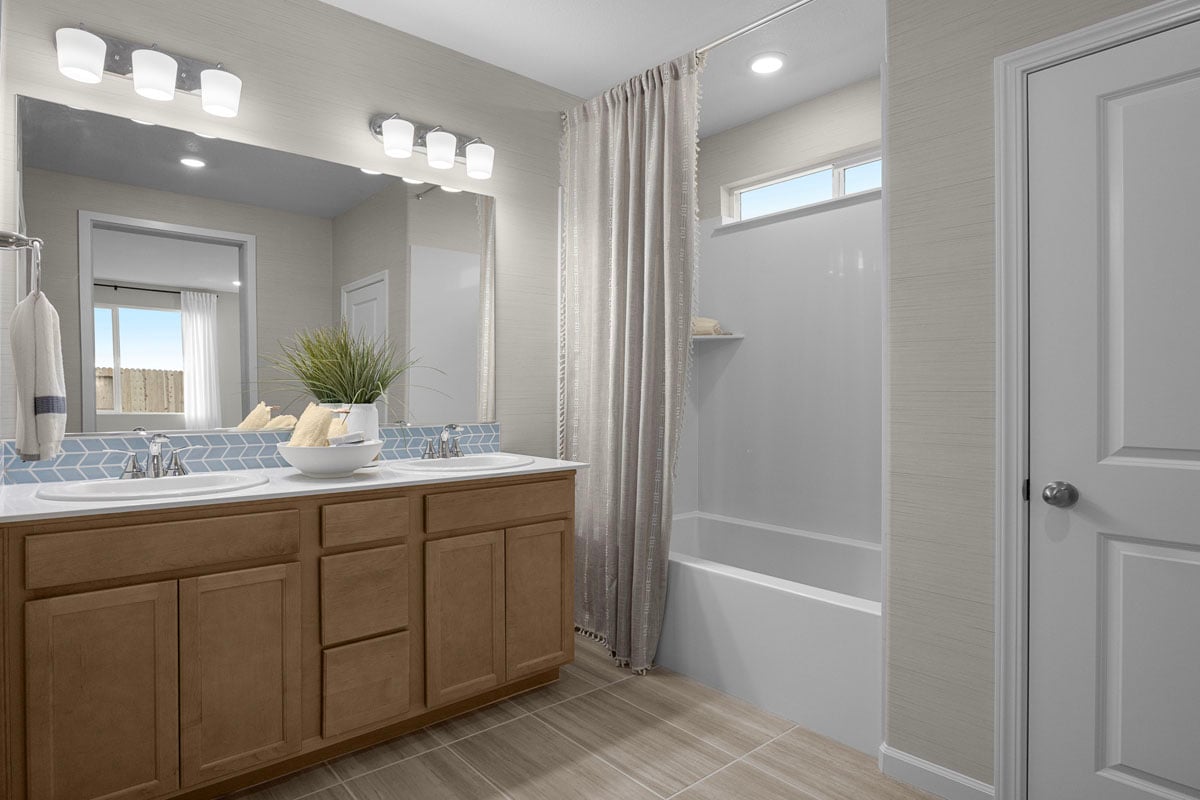 Dual-sink vanity at primary bath