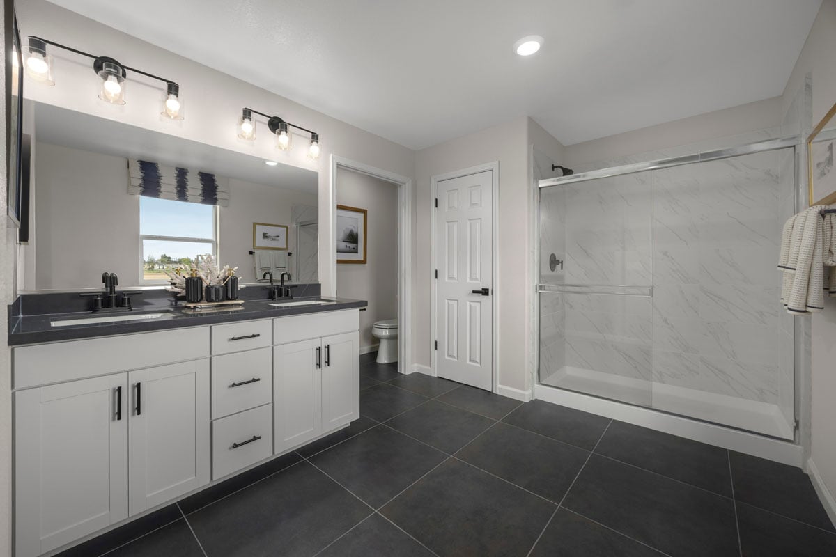 Walk-in shower at primary bath 