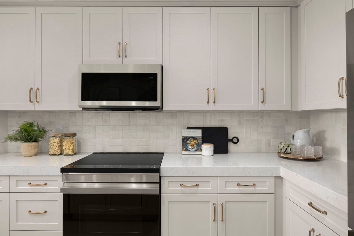 Optional quartz countertops with custom tile backsplash