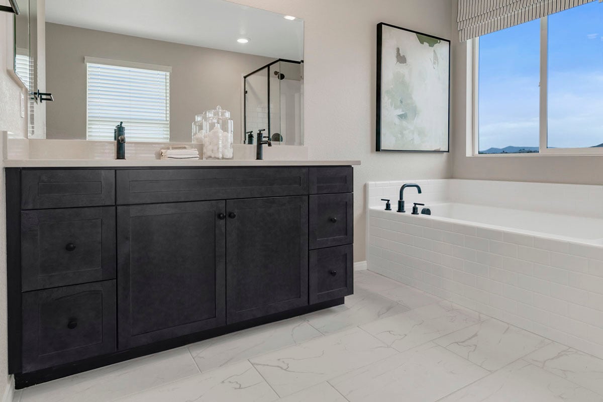 Upgraded Maple cabinets with black knobs