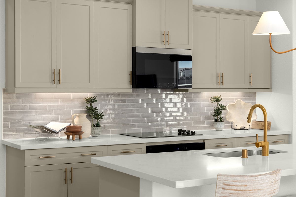Optional quartz countertops and custom tile backsplash