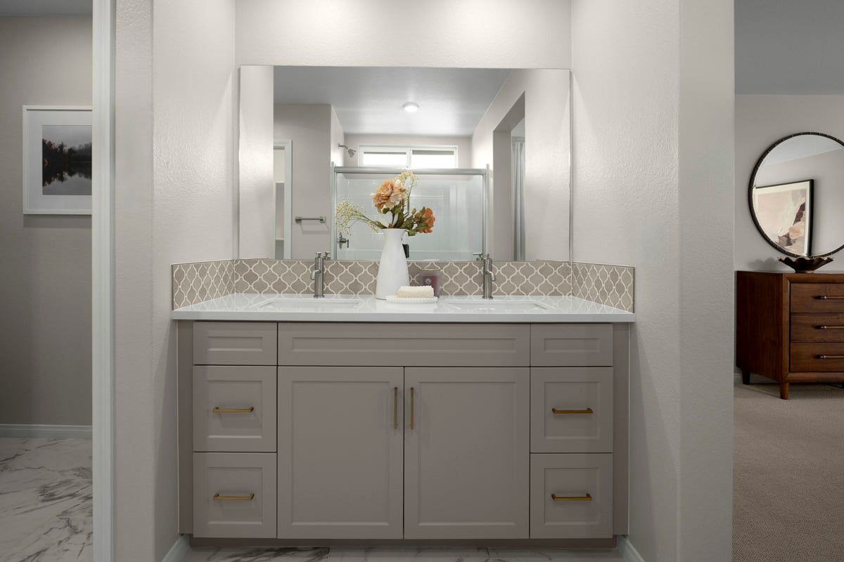 Optional custom tile backsplash at primary bath