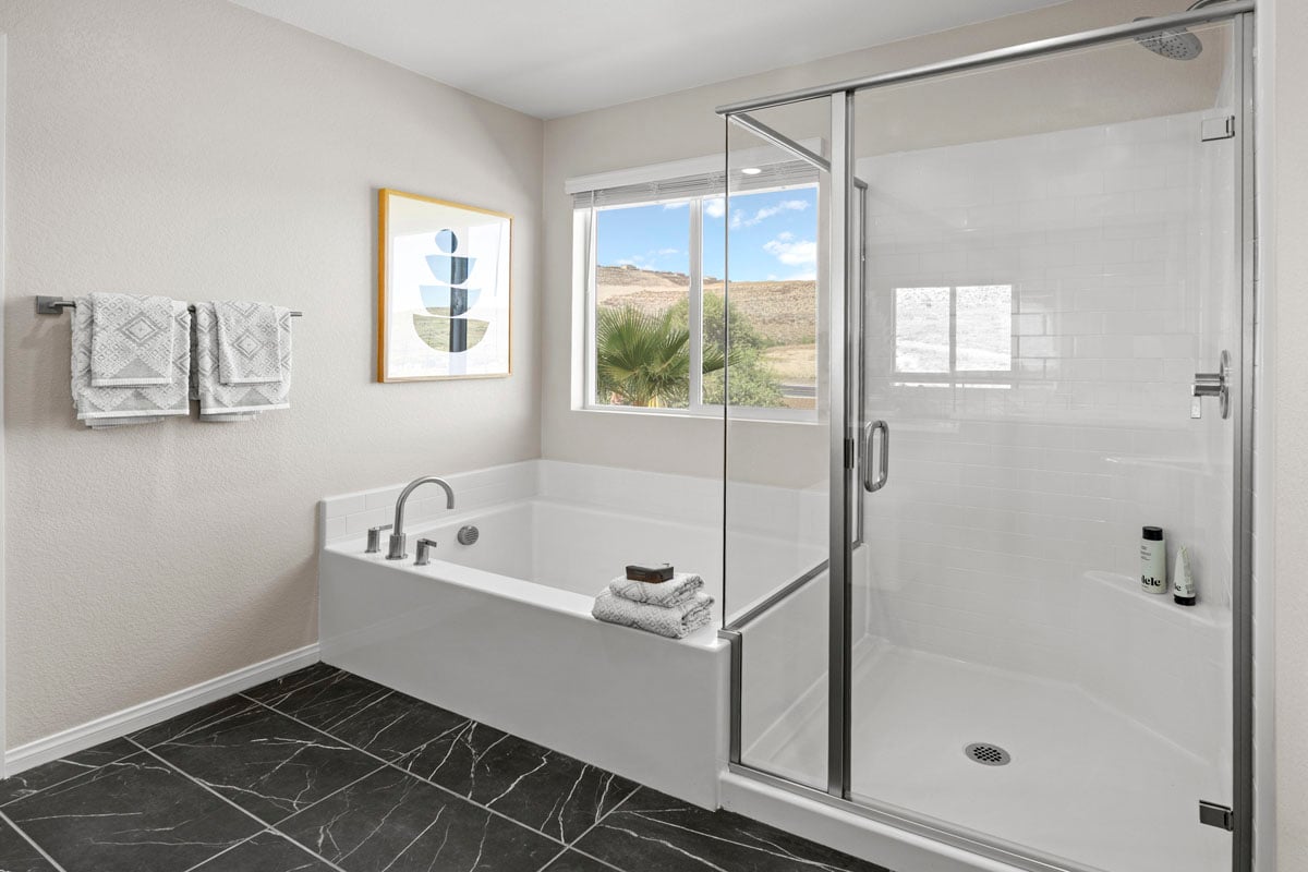 Optional separate tub and walk-in shower at primary bathroom