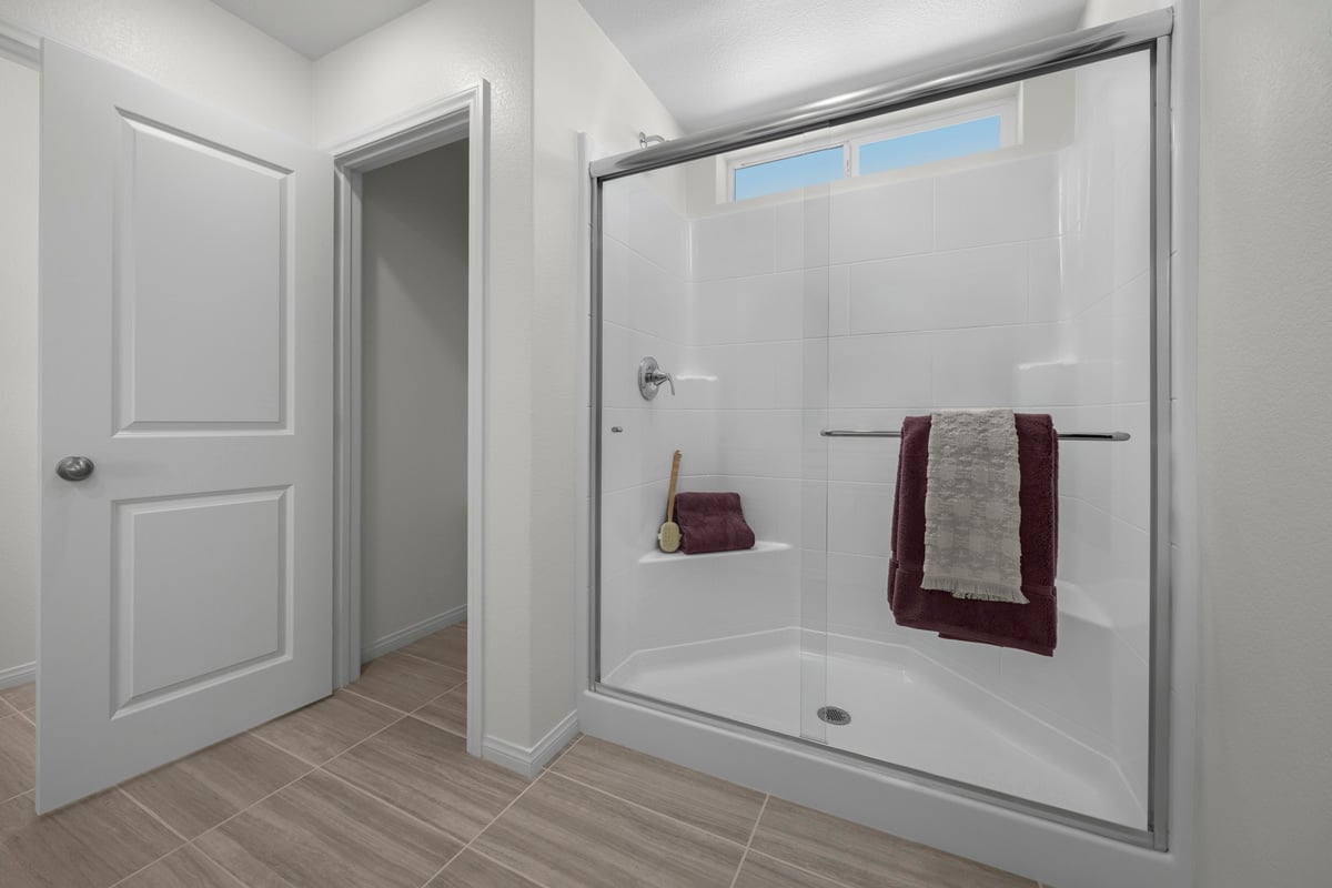 Walk-in shower at primary bath