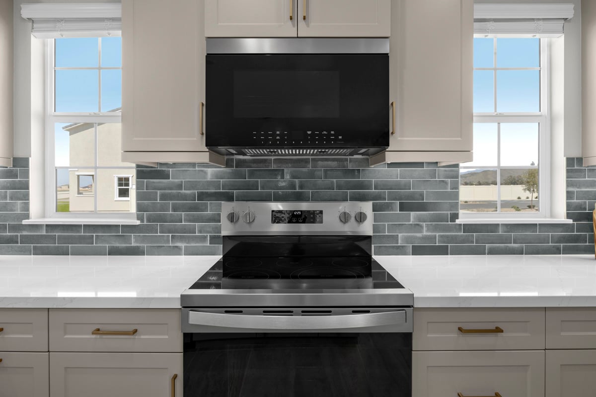 Optional custom tile backsplash and quartz countertops