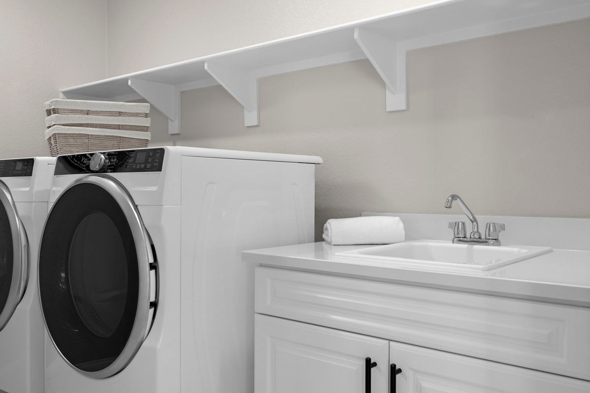 Optional laundry sink with lower cabinets