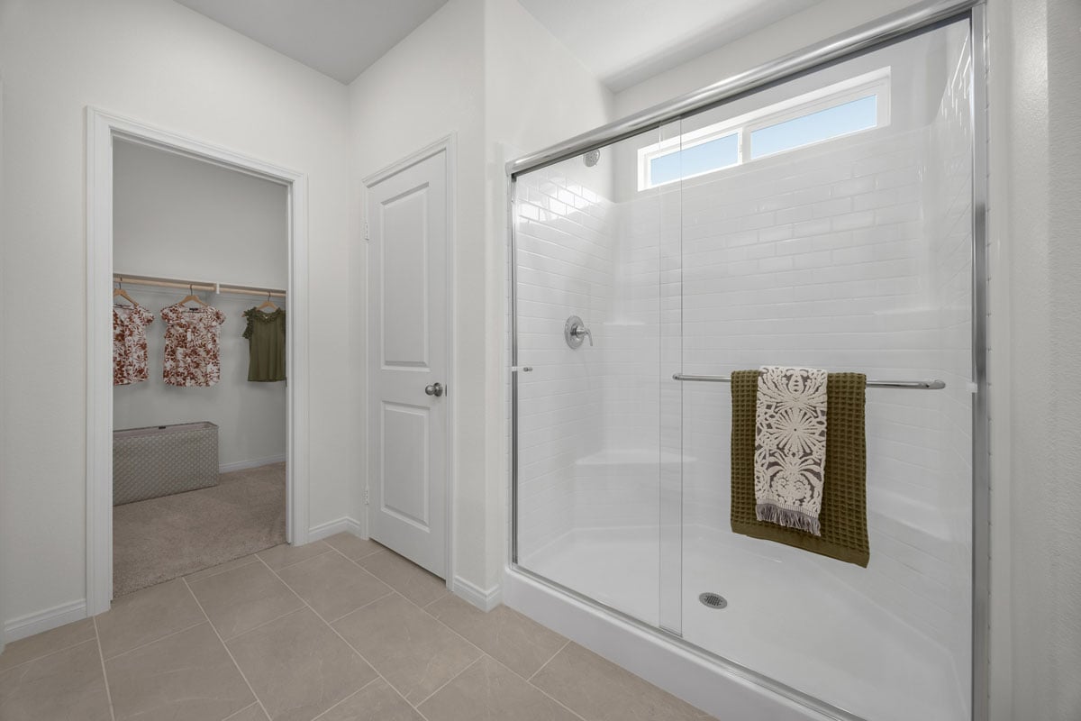 Walk-in shower at primary bath