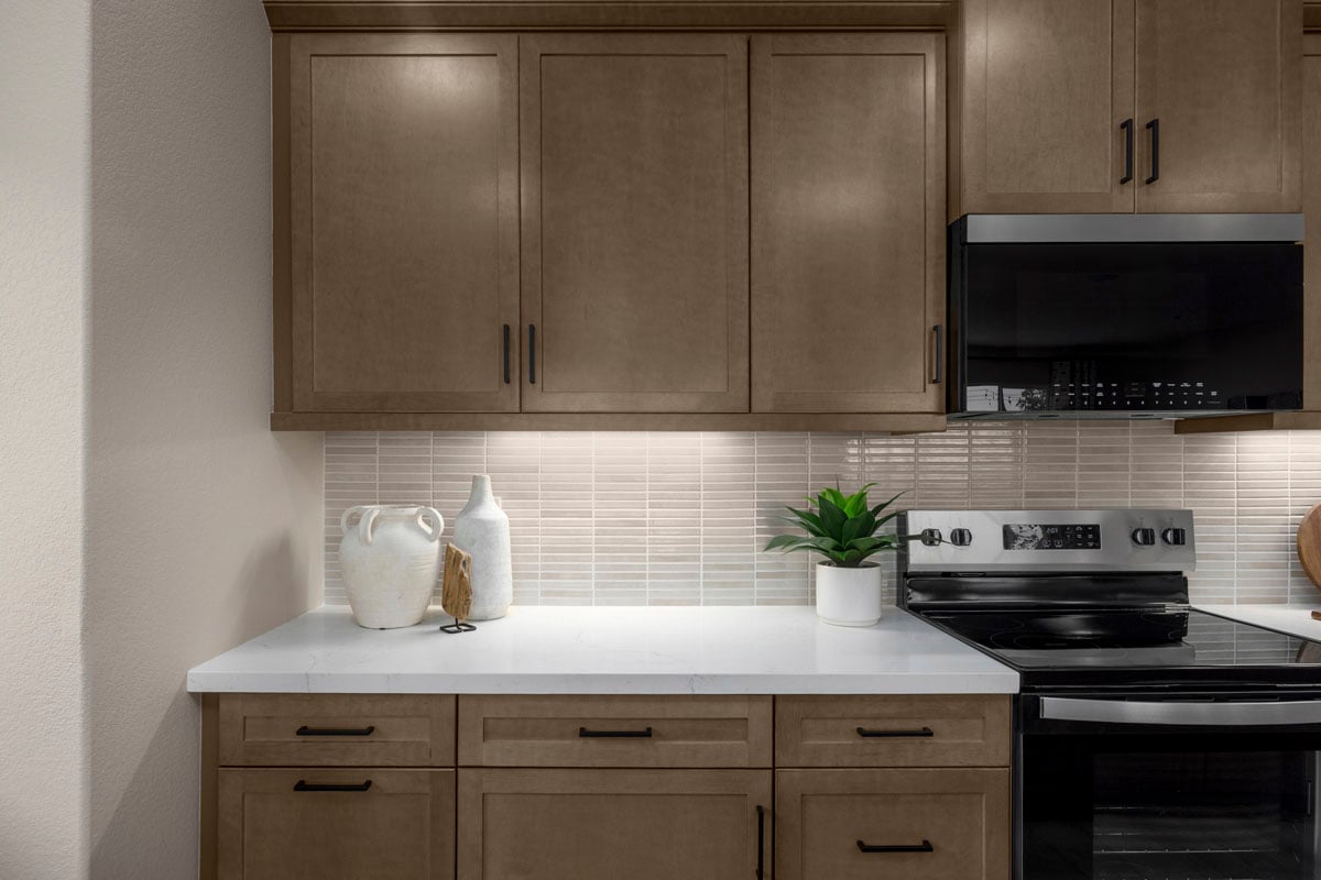 Optional quartz countertops with custom tile backsplash