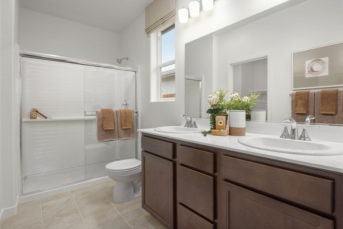 Solid-surface countertops at primary bath