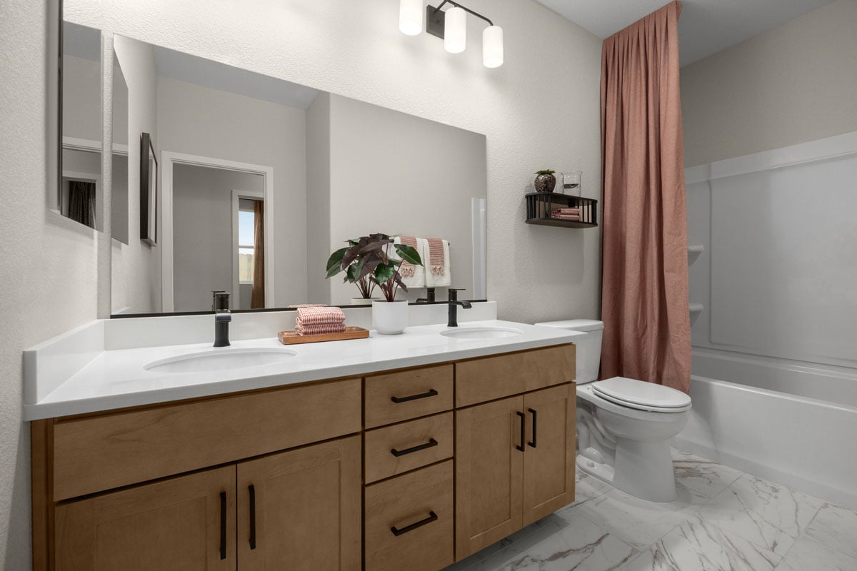 Dual-sink vanity in secondary bathroom