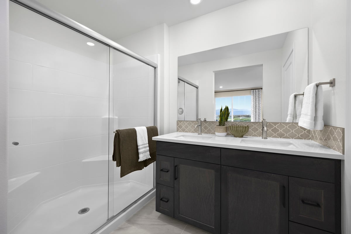 Optional custom tile backsplash at primary bath