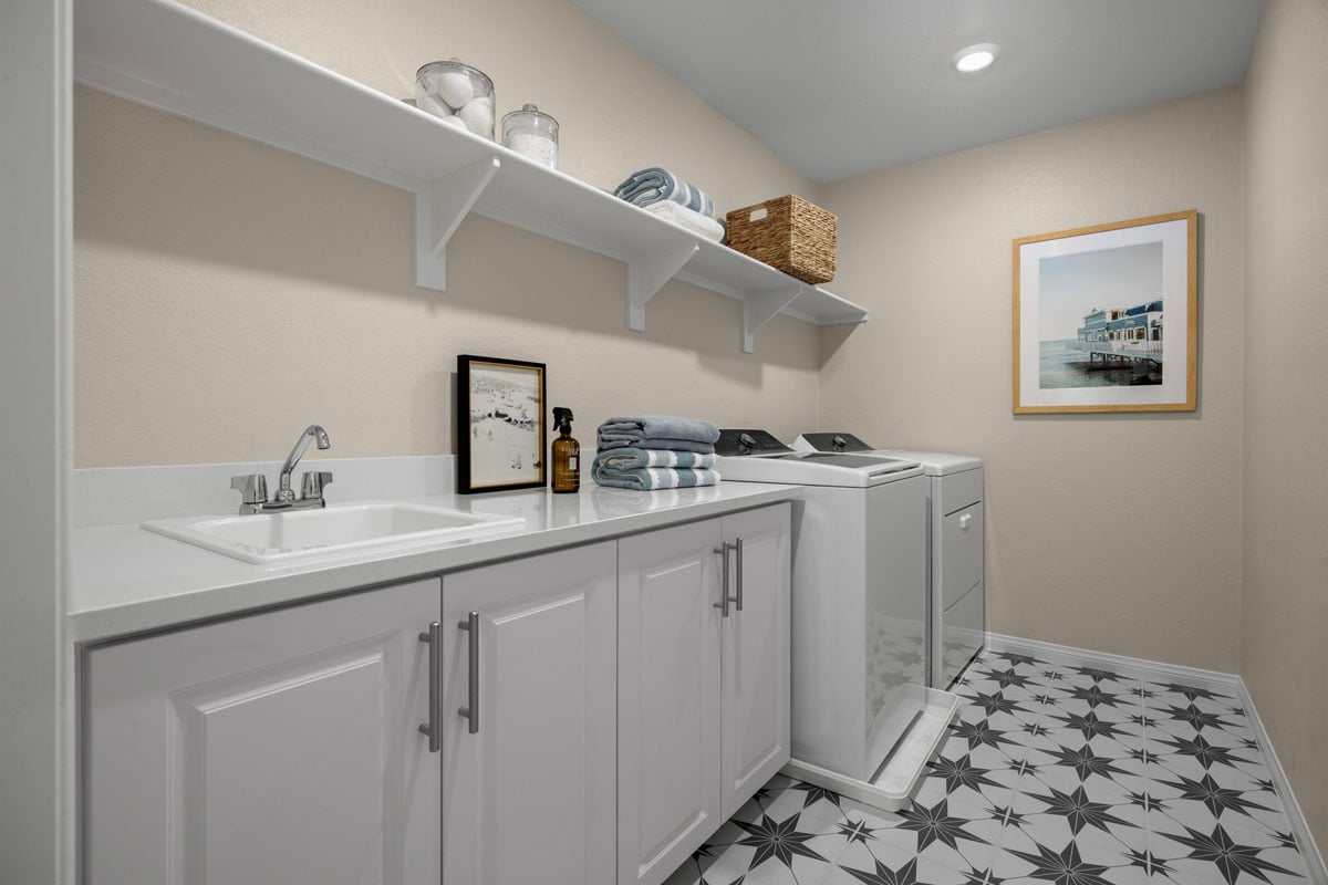 Optional sink and cabinets at laundry room