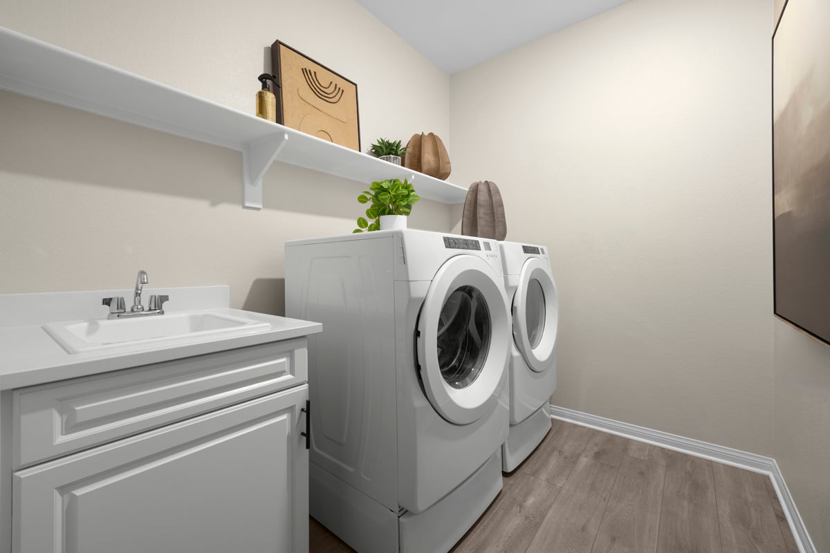 Optional sink and lower cabinets at laundry room