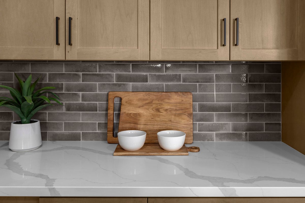 Optional quartz countertops and custom tile backsplash