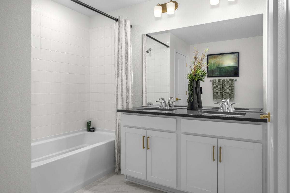 Dual-sink vanity at primary bath