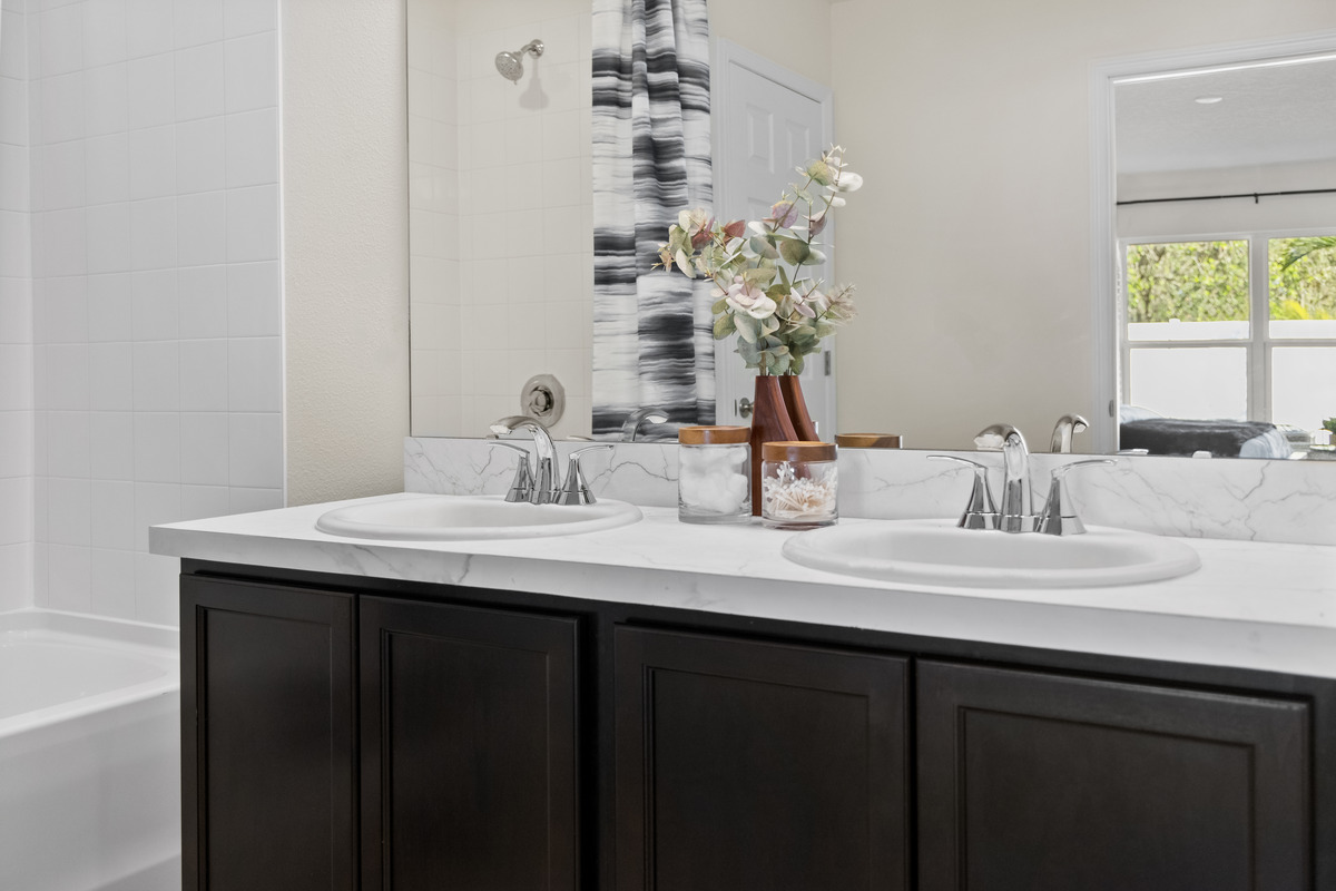 Dual-sink vanity at primary bath