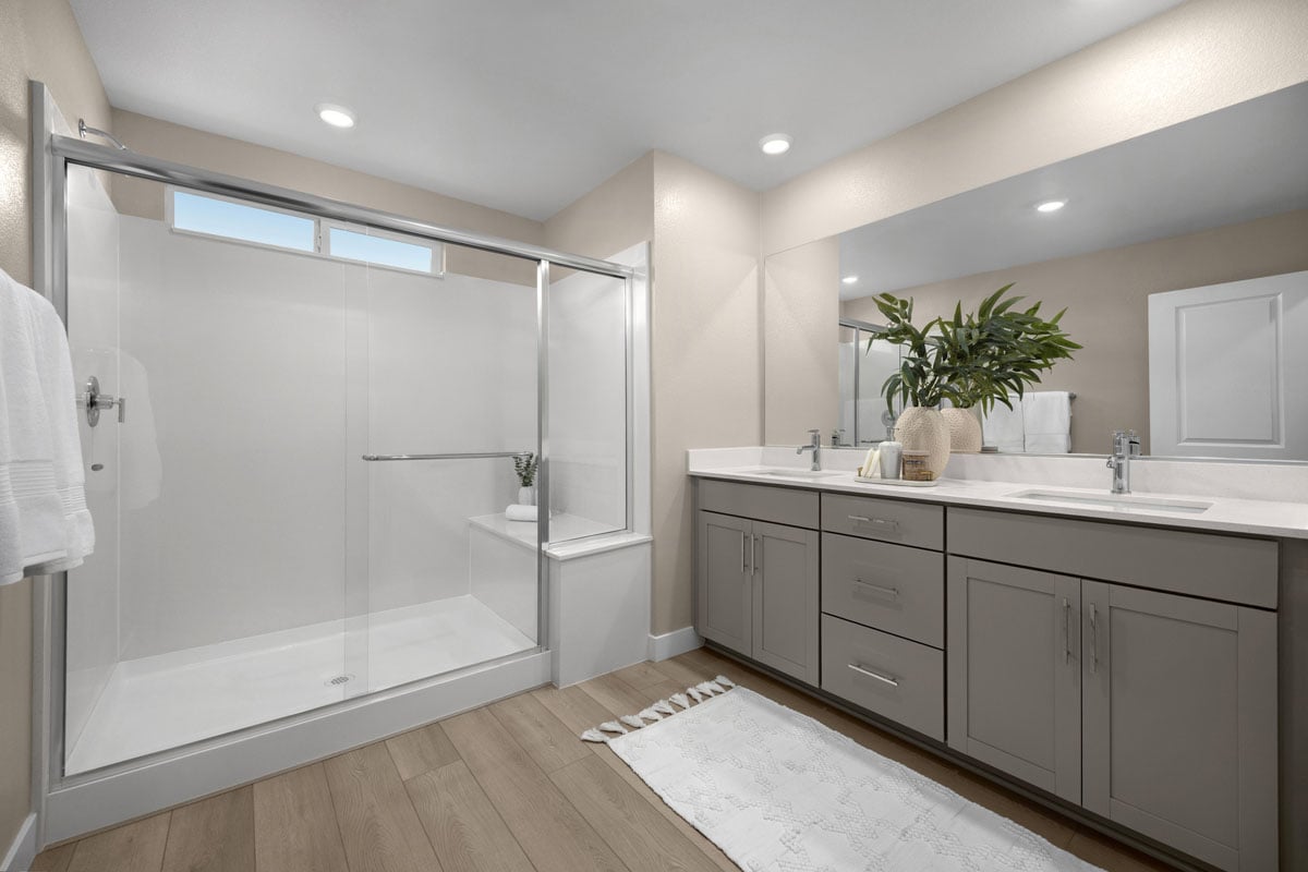 Walk-in shower with seat at primary bath