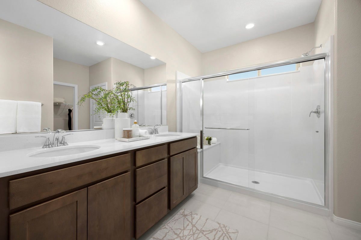 Walk-in shower with seat at primary bath