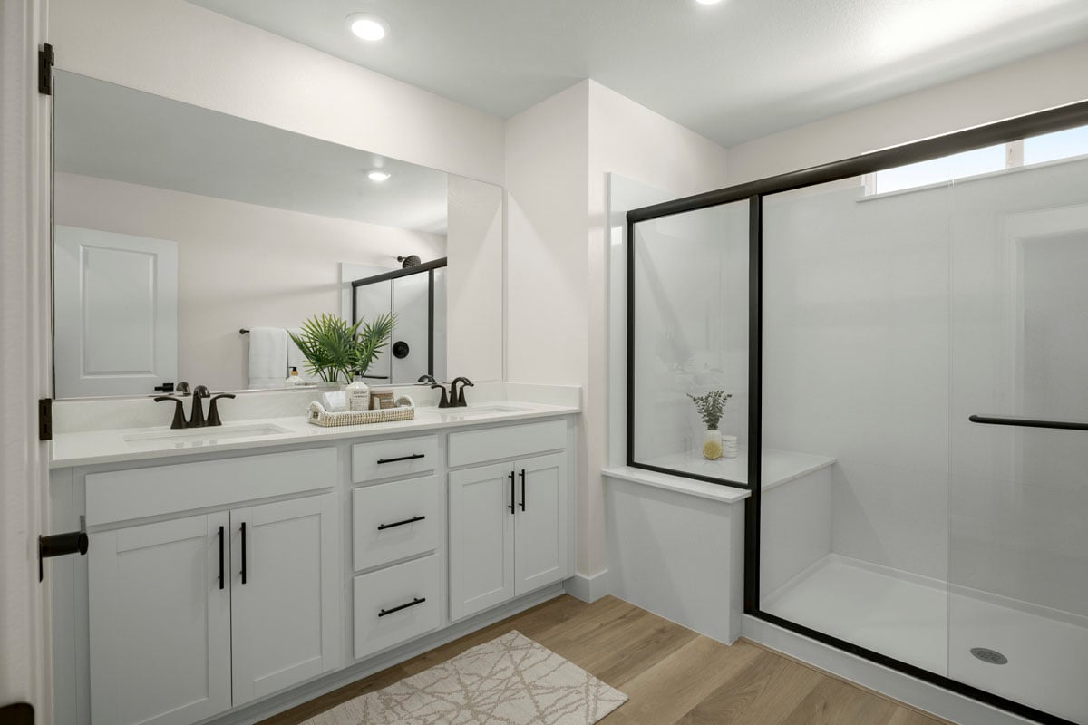 Walk-in shower with seat at primary bath