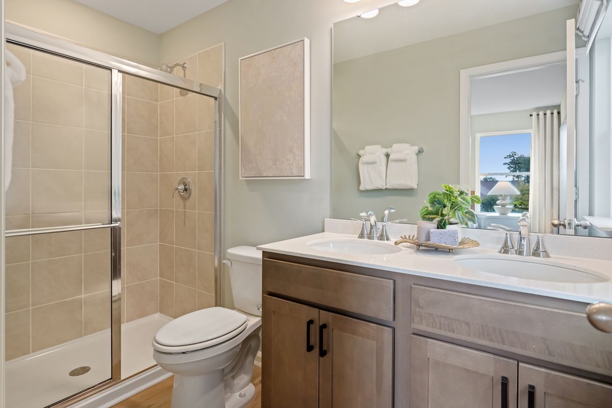 Dual-sink vanity at primary bath