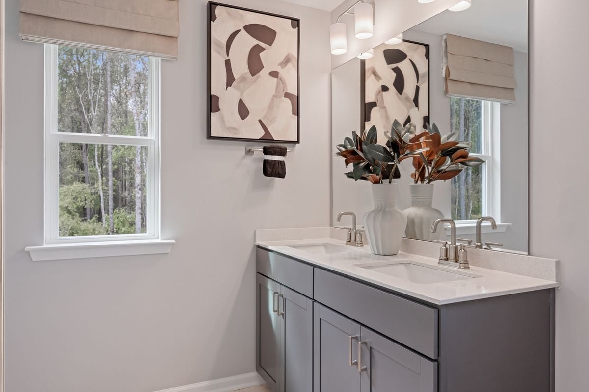 Dual-sink vanity at primary bath