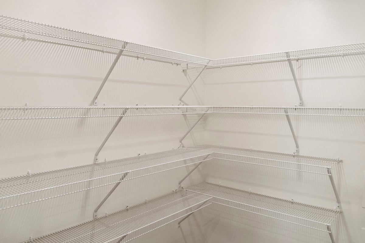 Walk-in closet at primary suite