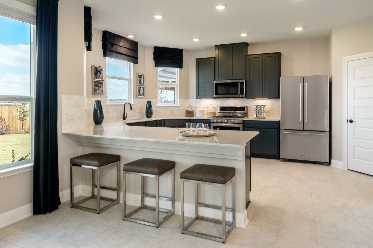 New Homes in Jarrell, TX - Sonterra-Cool Water Plan 2070 Kitchen