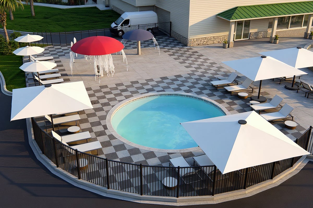 Planned community splash pad and children’s area