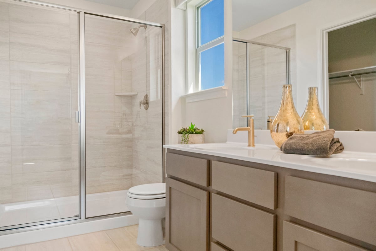 Shower with tile surround at primary bath