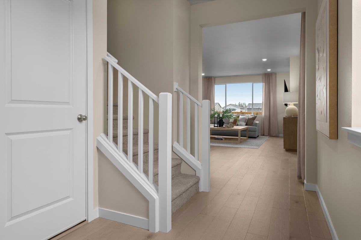 Luxury vinyl plank flooring at hallway and great room