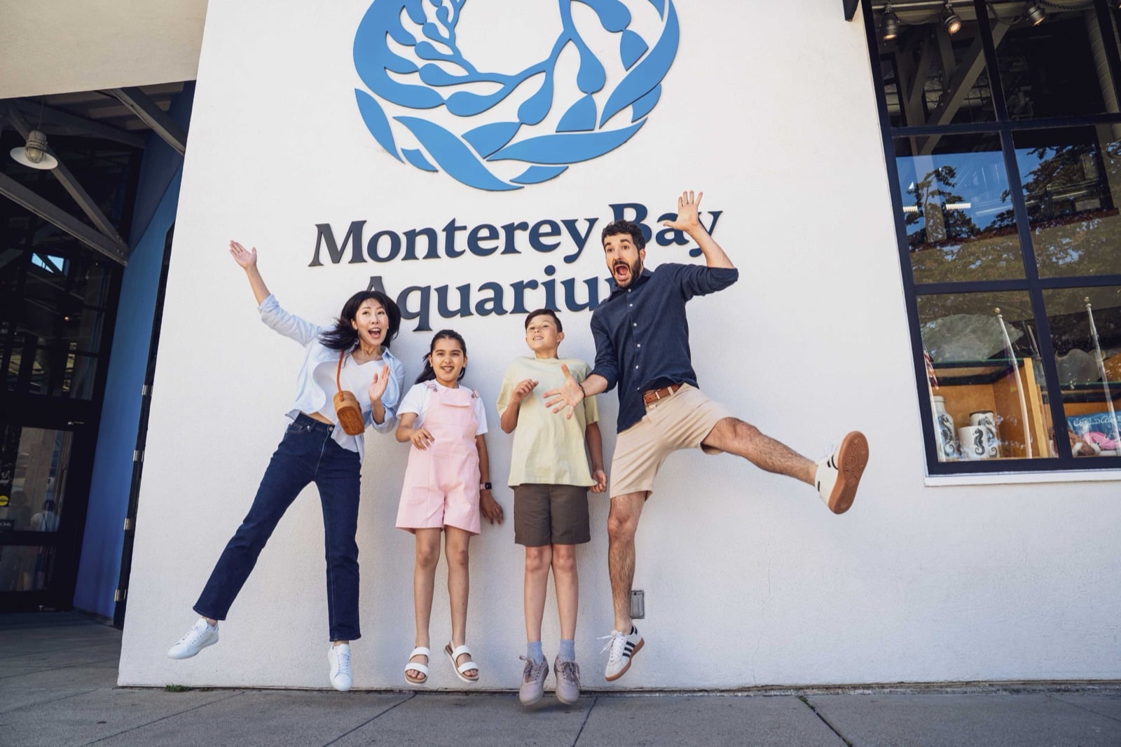 A family visiting the Monterey Bay Aquarium